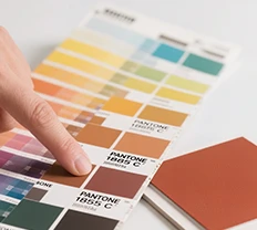 Premium finishing options like foil, embossing, and soft-touch lamination