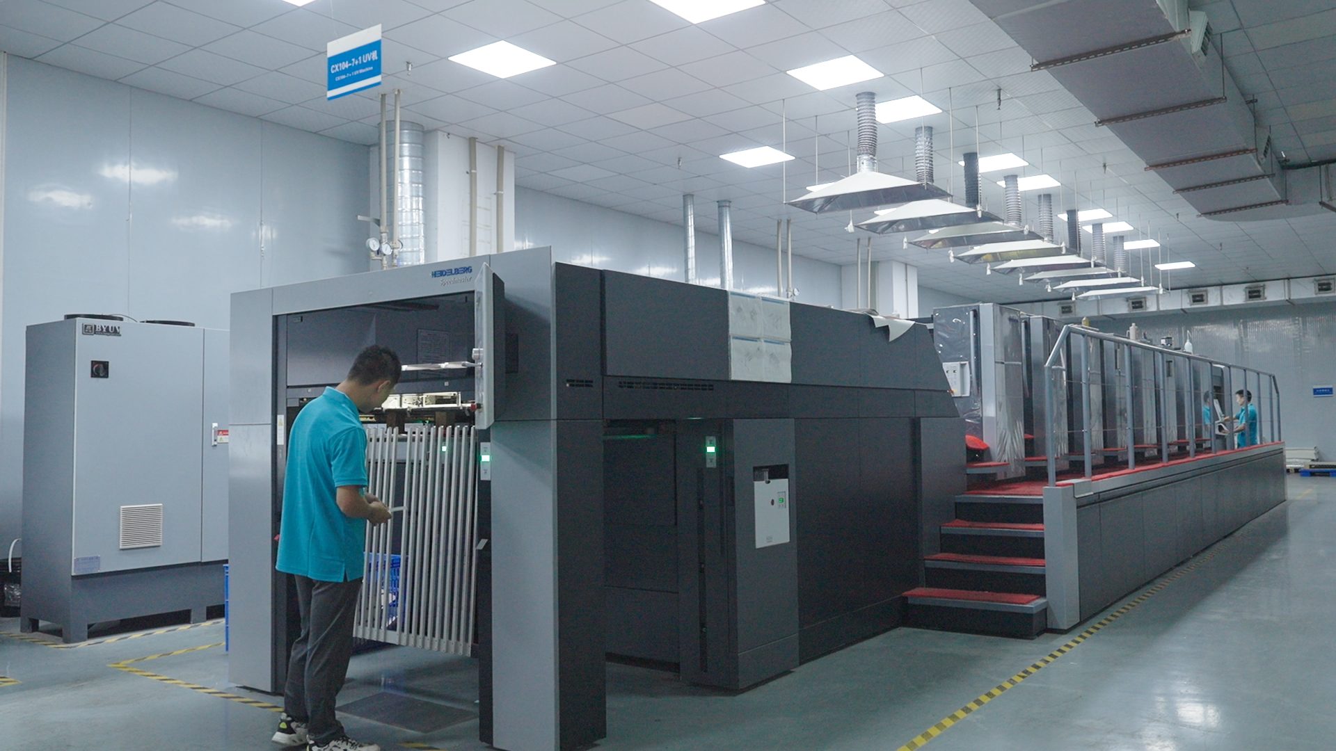 Heidelberg offset press line applying moisture-resistant coatings and surface finishes