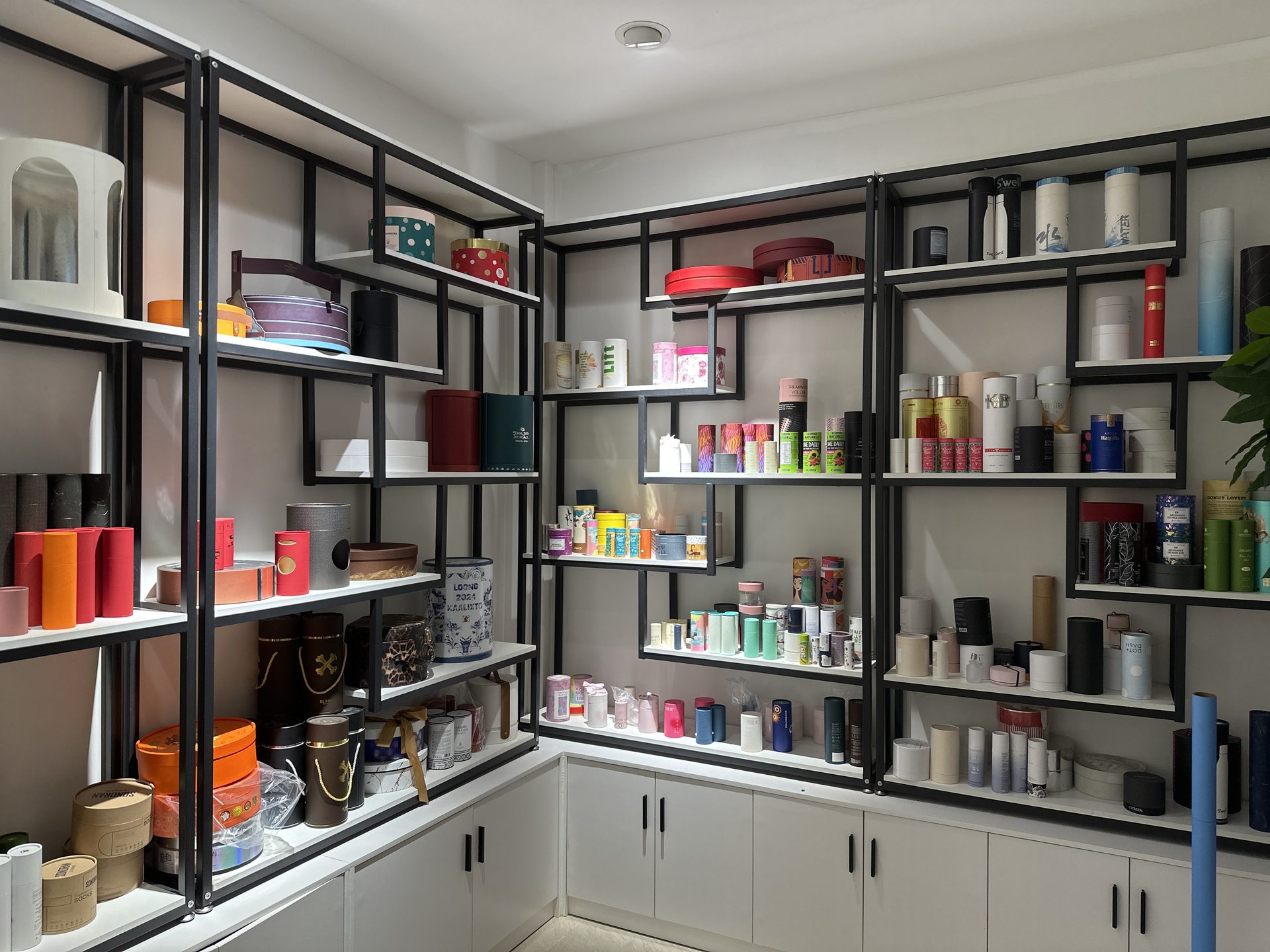 Packaging sample room where moisture-prevention briefs and prototypes are reviewed