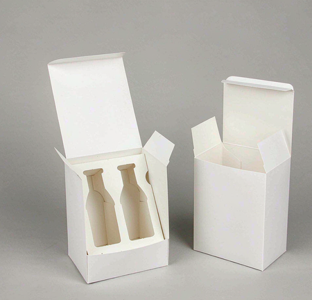 Blank white rigid box shown open with a die-cut paper insert tray with bottle-shaped cutouts