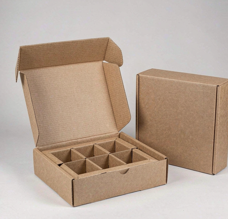 Custom inserts and partitions protect folded garments during transit